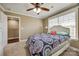 Bedroom featuring a ceiling fan, large window with blinds, and neutral-toned walls at 2375 Ellison Cir, Lancaster, SC 29720