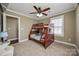 A bedroom featuring a bunk bed set, carpeted floors, and natural light at 2375 Ellison Cir, Lancaster, SC 29720