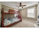 A bedroom featuring a bunk bed set, carpeted floors, and natural light at 2375 Ellison Cir, Lancaster, SC 29720