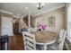 Cozy breakfast nook with wood table, staircase and view to the main bedroom at 2375 Ellison Cir, Lancaster, SC 29720