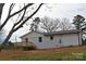 Home's exterior featuring a new deck, fresh paint, and well-maintained landscaping at 2400 Pressley Rd, Chester, SC 29712