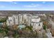 A high angle view of the luxury apartments featuring a swimming pool and lush greenery, offering an upscale lifestyle at 2823 Providence Rd # 156, Charlotte, NC 28211