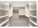 Walk-in closet with shelving and carpet flooring is ready for organization at 2823 Providence Rd # 156, Charlotte, NC 28211