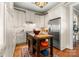 Bright kitchen with an island, stainless steel refrigerator, and custom cabinetry for ample storage at 2823 Providence Rd # 156, Charlotte, NC 28211