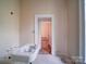 Bright bathroom with vanity and tiled floors at 303 Wade St, Wadesboro, NC 28170