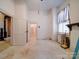 Bedroom with vintage radiator, fireplace, and closet with door leading to bathroom at 303 Wade St, Wadesboro, NC 28170