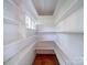 White-walled pantry with built-in shelving at 303 Wade St, Wadesboro, NC 28170