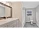 Updated bathroom featuring modern vanity, mirror, and fixtures at 315 E Washington Ave, Bessemer City, NC 28016