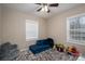 Neutral colored bedroom with a window and toys for to play with at 3155 Ramseur St, Lincolnton, NC 28092