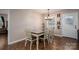 Dining area featuring modern lighting, natural light, and open space for comfortable living and entertaining at 3155 Ramseur St, Lincolnton, NC 28092