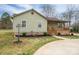 Charming single-story home featuring light green siding, a brick foundation, and a cozy front porch at 3155 Ramseur St, Lincolnton, NC 28092