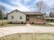 Charming single-story home with a welcoming front porch and well-maintained landscaping and a metal carport on the right at 3155 Ramseur St, Lincolnton, NC 28092