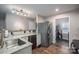 Functional kitchen featuring granite countertops, a stainless steel appliances, and easy access to the adjacent laundry area at 3155 Ramseur St, Lincolnton, NC 28092