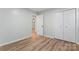 Bedroom with wood-look floors and closet space at 325 Spring Oak Dr, Salisbury, NC 28147