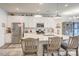 Bright kitchen with white cabinets, granite countertops, and a stainless steel refrigerator, perfect for culinary enthusiasts at 3941 Rothwood Ln, Harrisburg, NC 28075