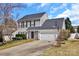 Charming two-story home featuring a two-car garage and well-maintained front lawn at 4007 Hermes Ln, Waxhaw, NC 28173