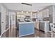 Well-lit kitchen featuring a center island, stainless steel appliances, and modern fixtures at 4007 Hermes Ln, Waxhaw, NC 28173