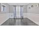 Grey painted space with dark floors and natural light coming through large windows at 4007 Hermes Ln, Waxhaw, NC 28173