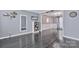 Grey painted space with wood floors and doorway leading to another room at 4007 Hermes Ln, Waxhaw, NC 28173