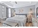 This main bedroom features stylish decor, a tray ceiling, and warm, inviting lighting at 4007 Hermes Ln, Waxhaw, NC 28173