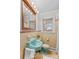 Bathroom featuring a classic tile, turquoise sink and toilet at 424 Virginia Ave, Statesville, NC 28677