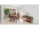 Classic dining room featuring a wooden table with chairs, complemented by a buffet and hutch at 424 Virginia Ave, Statesville, NC 28677