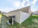 Backyard view of a home and its white privacy fence, with a garbage can on the side at 430 Battery Cir, Clover, SC 29710