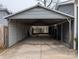 Spacious carport offers covered parking and protection from the elements, convenient and practical at 4408 Pebblebrook Dr, Charlotte, NC 28208