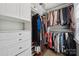 Organized walk-in closet with custom shelving and ample storage space at 4811 Dawnridge Dr, Charlotte, NC 28226