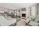 Inviting living room with fireplace and seamless transition into the modern kitchen at 4811 Dawnridge Dr, Charlotte, NC 28226