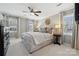 Spacious main bedroom featuring neutral colors, ample natural light, and a ceiling fan at 4811 Dawnridge Dr, Charlotte, NC 28226