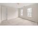 Bedroom with two windows and neutral color paint, providing a blank canvas for personalization at 4918 Sarah Hall Ln, Charlotte, NC 28270