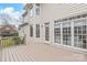 Spacious deck with an exterior view of the home and multiple windows, great for relaxing outdoors at 4918 Sarah Hall Ln, Charlotte, NC 28270