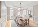 Formal dining room with natural light, tray ceiling, neutral paint, chair rail, and seating for six or more guests at 4918 Sarah Hall Ln, Charlotte, NC 28270