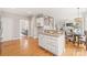 View of the kitchen and an eat-in breakfast area with hardwood floors at 4918 Sarah Hall Ln, Charlotte, NC 28270