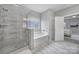 Modern bathroom featuring a glass shower, soaking tub, and contemporary tile work at 5158 Mill Creek Rd, Clover, SC 29710