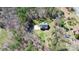 Aerial shot showing a house with a driveway, surrounded by trees and greenery, creating a private setting at 5369 Concord Rd, York, SC 29745