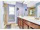 Bathroom with a large mirror, double sink, and glass-enclosed shower at 5369 Concord Rd, York, SC 29745