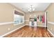 Light-filled dining room featuring hardwood floors and white trim at 5369 Concord Rd, York, SC 29745