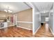 Hallway with hardwood floors and views into the dining area at 5369 Concord Rd, York, SC 29745