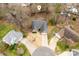 Overhead view of a house in a quiet neighborhood showing its roof, driveway, and proximity to neighboring homes at 6311 Gold Dust Ct, Charlotte, NC 28269