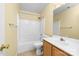 The bathroom has tile floors, shower-tub combo, and a vanity with storage at 6311 Gold Dust Ct, Charlotte, NC 28269