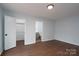 Bedroom showing the ensuite bathroom and walk-in closet at 6415 Santa Cruz Trl # 11, Charlotte, NC 28227