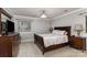 Relaxing bedroom featuring a comfortable bed, dresser, and a soothing color palette at 7305 Park Vista Cir, Charlotte, NC 28226