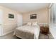 Cozy bedroom with neutral walls, plush carpet, and ample natural light offers a relaxing retreat at 7305 Park Vista Cir, Charlotte, NC 28226