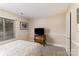 This bedroom features carpet floors, neutral walls, and a window that provides natural light at 7305 Park Vista Cir, Charlotte, NC 28226