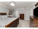 Cozy bedroom with plush carpeting, a ceiling fan, and neutral walls at 7305 Park Vista Cir, Charlotte, NC 28226