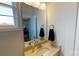 Bathroom with modern vanity and mirror reflecting a view to an adjacent room at 7669 Bainbridge Rd, Sherrills Ford, NC 28673