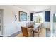 Elegant dining room with stylish decor, natural lighting, and a modern chandelier at 7669 Bainbridge Rd, Sherrills Ford, NC 28673