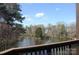 Scenic view of lake and trees from the balcony at 8149 Cedar Glen Dr # 8149, Charlotte, NC 28212